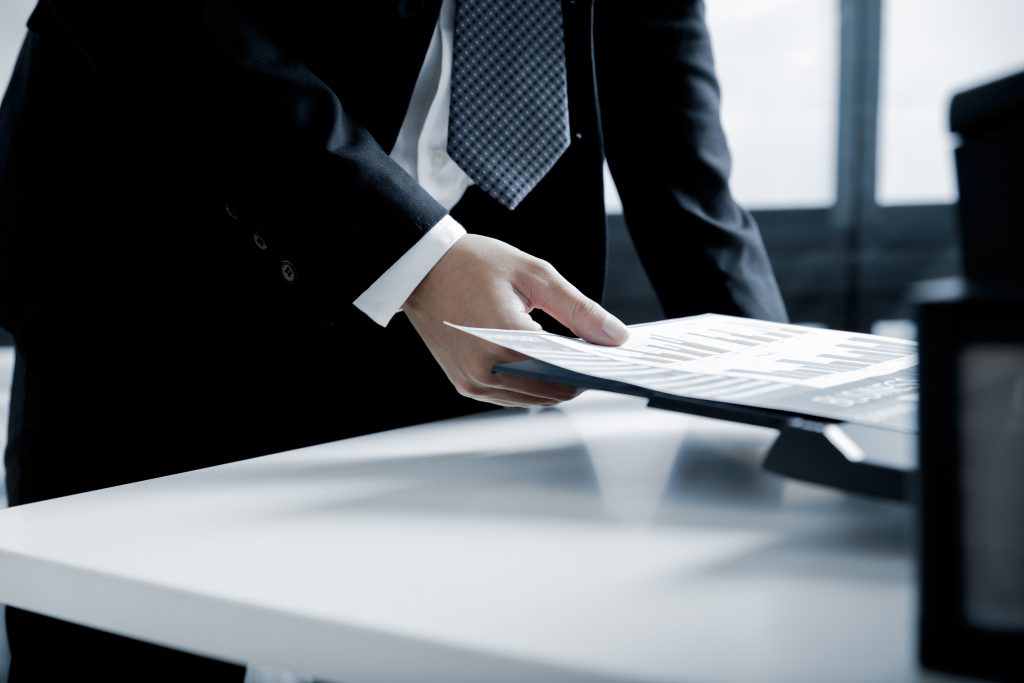 businessman using a printer