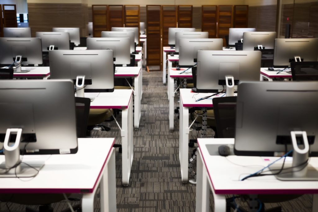 rows of computers in a classroom